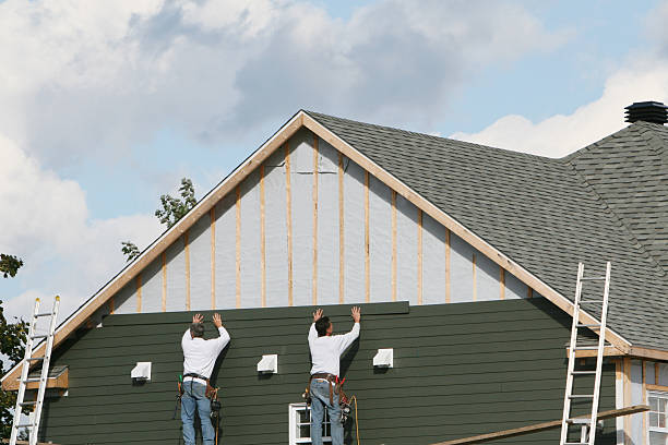 Professional Emergency Siding Repair technician working in Cairnbrook, PA